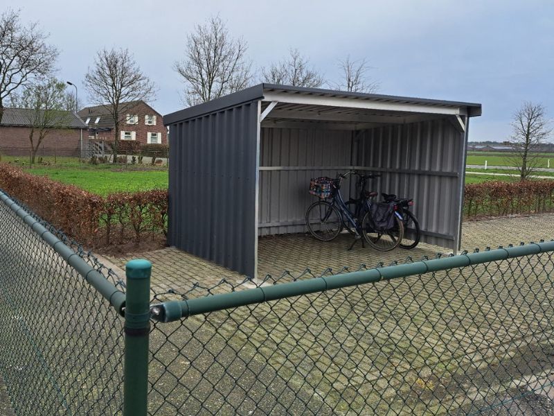 Bekijk een prefab fietsenhok